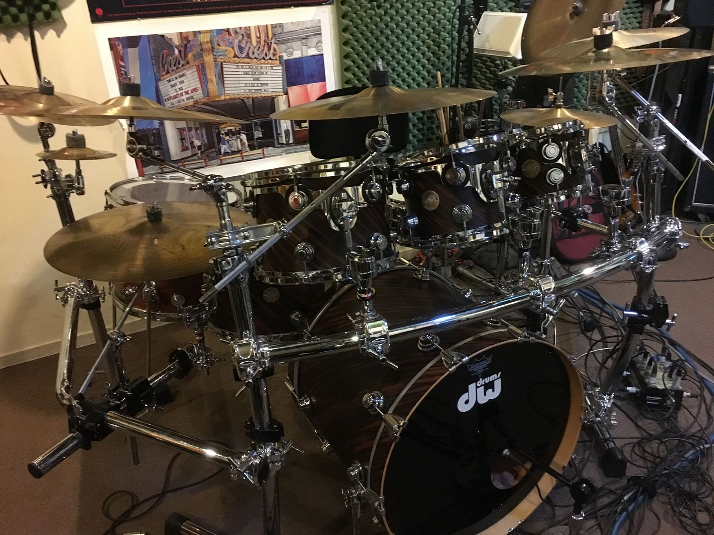 Cymbal stands connected to mounted tom stands?
